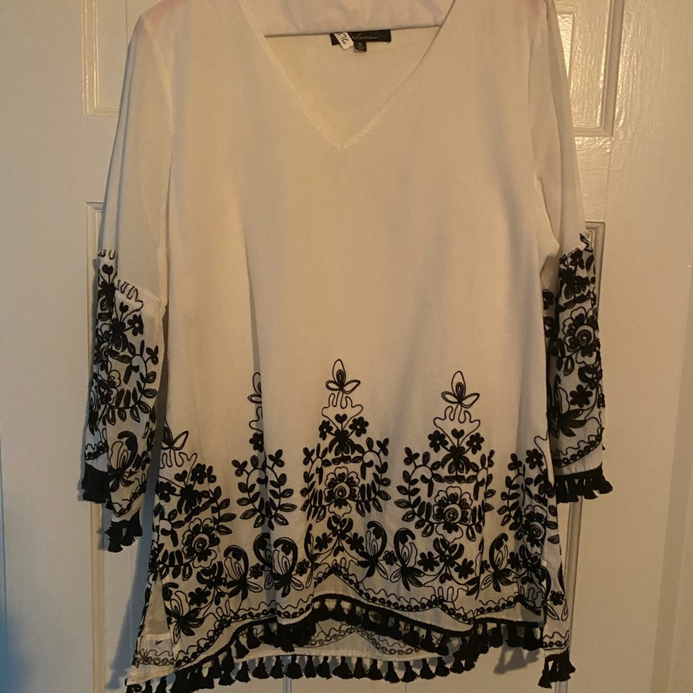 Beautiful linen top with detailed embroidery